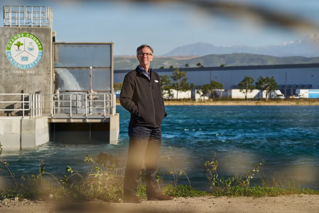 Roy Herndon, chief hydrogeologist at the Orange County Water District, at the La Palma Recharge Basin in Anaheim on Jan. 26, 2023. The basin was built on 14 acres of former Boeing property. (Photo by Bing Guan for CalMatters)