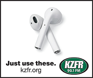 A pair of earbuds on a clean white background. Just use these. kzfr.org