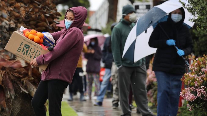 Long Lines Of People Wait At Food Distribution Center In Southern California
