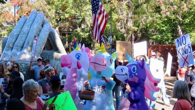 1. Unicorns and other No Kings protesters at Big Hands sculpture, Chico, October, 2025 by Ken Magri